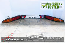 JDM 91-99 Mitsubishi 3000GT GTO VR4 OEM Rear Tail Lights Lamps & Center Garnish - view 1
